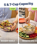 5 In 1 Kitchen Prep And Storage Bowl System Featuring Crinkle Slice And Shred Blades For Real Deal Meal Prep And Hosting Like A Champ With Secure Snap Lids, 5-cup and 7-cup bowls with salads and spreads.