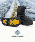 Rock Solid Ice Grip Winter Hiking Boots With 32 Replaceable Aluminum Studs And Sturdy Heel Spikes For Nasty Trail Traction Cold Weather Workhorse Footwear, showing sole with yellow studs on snowy surface.