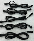 Heavy Duty 18AWG Four Core Waterproof Extension Cord Male To Female Plug Black rugged cables arranged vertically on a surface.