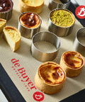 Perforated Round Tart Ring, 6 Inch Diameter And 1.4 Inch Height, Perfect For Golden Crispy Tart Crusts, Bakery Grade Bakeware, made in France on baking mat with pastries
