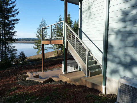 Rock Solid Rubber Grommets For 3 16 Inch Stainless Steel Cables Metal Cable Railing Posts shown with deck and stairs.