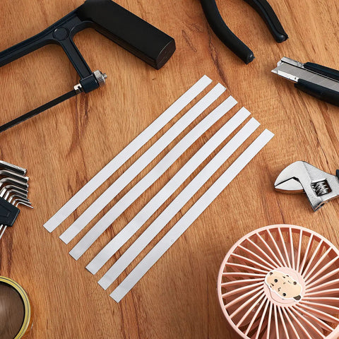 Pro Grade Twenty Pack Reflective Tachometer Tape Strips For Optical And Laser Tachometers on a wooden table