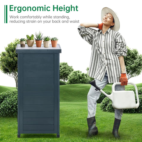 Must Have Outdoor Storage Cabinet And Potting Bench With Metal Top Shelves For Patio Garden Easy Setup Weatherproof Wooden Planting Workstation In Anthracite Grey next to a person gardening.