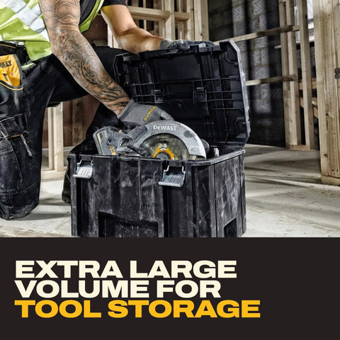 Worker accessing extra large TSTAK toolbox with removable tray for quick tool access and water debris resistant build.