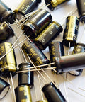 Top Shelf Low Impedance Electrolytic Capacitors 1000 Uf 35 Volt Bulk Pack, 105°C rated, various sizes scattered.
