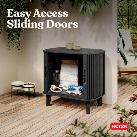 Velo 30 Gallon Outdoor Storage Cabinet With Weather Resistant Resin Construction in patio, sliding doors open, graphite finish