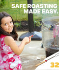 Child using Smores Sticks For Fire Pit And Campfire Kit With Long 32 Inch Stainless Steel Roasting Forks For Marshmallows Hot Dogs
