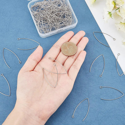 V Shape Earring Hooks With Horizontal Loop In 304 Stainless Steel For DIY Jewelry Making on a hand, coin for scale