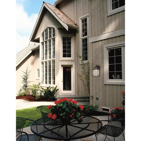 Solid Exterior Wall Lantern Featuring Slick Weathered Patina Cast Aluminum Body Plus Crisp Seeded Glass Panes For Front Porches And Driveways near entryway.