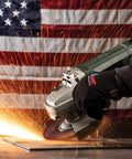 Worker using Long Life All Purpose Grinding Wheel Type 27 Depressed Center for Ferrous Metals with sparks flying