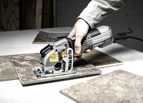 Professional 3 Piece Circular Saw Blade Kit For Versacut being used to cut ceramic tiles on a work surface.