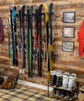 Heavy Duty Wall Mount Ski Rack That Locks Up To Five Pairs Smoothly keeps skis organized on a wooden wall, under 300 lb limit.