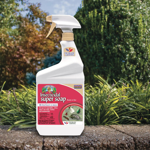 Captain Jack's Insecticidal Super Soap 32 Oz Ready To Use Spray bottle against garden background