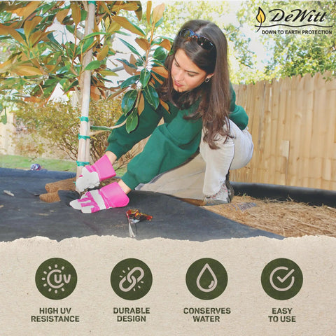 Woman using Workhorse Heavy-Duty 3 Oz Weed Control Fabric Ground Cover for Gardens and Landscaping, Brown, in yard