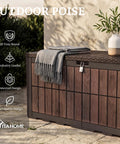 134 Gallon Waterproof Resin Outdoor Deck Box With Lock Doubles As Bench Seating For Patio Cushions Garden Tools And Pool Accessories No Fuss Heavy Duty Weather Ready Dark Brown Wood Grain Finish with a blanket and plant on top