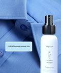 The Ultimate 3 In 1 Wrinkle Release Spray That Kicks Static Cling And Cuts Odor For Crisp Clothes Without Ironing In A Legit Plant Derived Quick Fix 3 Oz Travel Bottle next to a blue shirt.