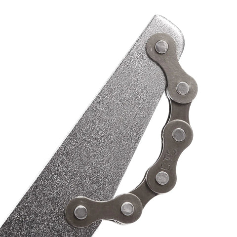 Close-up of Bicycle Freewheel Chain Whip And Cassette Sprocket Remover Tool Set for Bike Repair, steel with red handle.