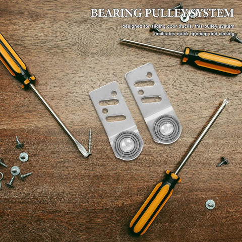 Four Pack Stainless Steel Sliding Door Pulley Wheels With Internal Ball Bearings For A Rock Solid Build And Runs Like A Dream Rail Glide positioned with tools on a wooden surface.