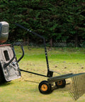 Side view of 60 Inch Tow Behind Lawn Dethatcher With 24 Spring Steel Tines, Heavy Duty Pine Needle And Pine Straw Rake For ATV UTV And Garden Tractors, Easy All In One Yard Cleanup Orange