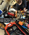 Man using Quad FlexiTray Flexible Tool Tray System For Milwaukee PACKOUT Compatible Organizer, non-slip grip, in workshop.