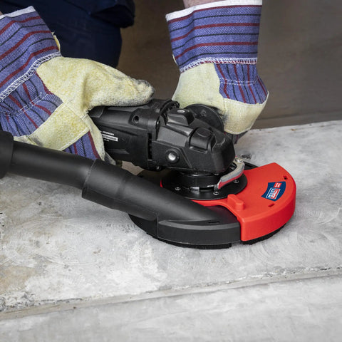 User installing Adjustable Angle Grinder Dust Shroud With Swivel Hose Hookup And Slick Edge Guard Fits 115 To 125 Mm Tools.