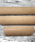 Unfinished Beech Wood Furniture Pulls Set Of 10 Paintable Wooden Cupboard And Drawer Handles on wood surface