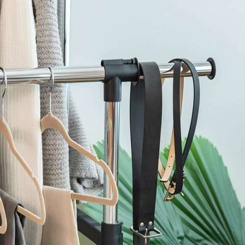 Close-up of Heavy Duty Double Rod Clothes Rack With Smooth Rolling Lockable Wheels And Height Adjustable Extendable Bar holding belts and hangers.