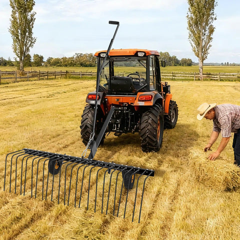 60 Inch Tow Behind Landscape Rake For ATVs And Mowers, Beefy Steel Teeth Dethatcher And Pine Straw Rake in field with tractor