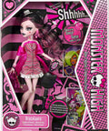 Iconic Design Draculaura Reproduction Doll In A Dope Pink Ruffle Dress showcasing pink outfit and accessories in packaging.