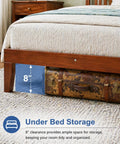 Rock Solid Queen Platform Bed Frame With Attached Brown Wood Headboard And Heavy Duty Pine Slats showing 8" under bed storage with suitcase