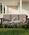 Woman relaxing on Textilene 3 Seat Porch Swing With Cup Holder 5.3 Ft Patio Hangin Swing Bench 700 Lb Capacity Outdoor Porch Swing With Hangin Chains For Deck Garden Backyard Gray in garden