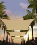 Backyard Go To 16 By 20 Beige Rectangle Sun Shade Sail Canopy Awning With UPF50 Plus Protection installed between palm trees