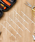 20 Pack Window Blind Repair Sliders And Shutter Connector Pins With 3.25 Inch Center Spacing heavy duty sliders on wooden surface.