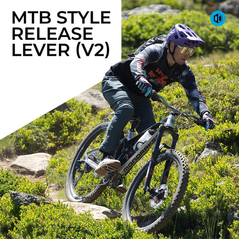 Cyclist on mountain trail using Nine Speed Mech MTB Shifter With Two Piece Pull Lever Up To Three Gears Per Click For Mountain Bikes Non E Bike Gear Shifter That Delivers Smooth Shifts And Crisp Gear Transitions