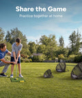 Father and son using Chipster Range PRO Golf Chipping Nets Portable Indoor Outdoor Practice Targets With Hitting Mat And 4 Foam Balls