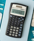 Legit Game Changing Scientific Calculator Featuring Two Line Display Advanced Statistics And Quick Fraction Conversions on a desk