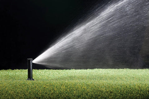 Nozzle Pack 32SA Replacement Set Of 6 Self Aligning Sprinkler Nozzles with matched flow rates spraying water on grass