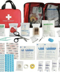 Portable Red Grab And Go First Aid Kit With Bandages Gauze And Care Accessories, ready to use medical supplies displayed