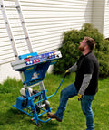 Pro Grade Gas Material Hoist 300 Lb Capacity Roof Lift with man operating it on grass, steel frame, easy setup for materials.