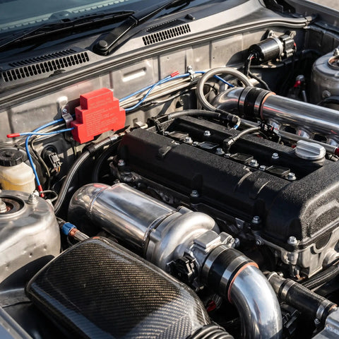 Hella Reliable Automatic Fire Extinguishing Device With Dual Nozzles For Electrical Panels And Control Cabinets Using Heat Triggered Thermal Release Suppression System Pack Of Two, showcased in engine compartment.