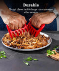 Bear Claw Meat Shredders 2 Pack Heat Resistant And Durable in use for pulling pork on a plate with ergonomic red handles.