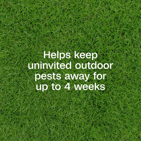 Green lawn with text 'Helps keep uninvited outdoor pests away for up to 4 weeks' showcasing yard spray benefits for pest protection.