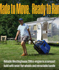 Man transporting Tri Fuel Portable Inverter Generator With Remote Start And Transfer Switch Ready near an RV in a campsite