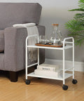 Sturdy White Two Tier Metal Rolling Utility Cart With Smooth Swivel Casters And Reinforced Steel Trays for home office beside a sofa