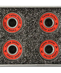 Abec Nine Six Zero Eight Scooter Bearings Feature Sealed Double Shielding For Friction Free Acceleration Reinforced Steel Housing Extends Overall Lifespan Built Tough For Urban Cruising And Park Stunts Glossy Racer Red Exterior Ships As A Ready Four, pack of four bearings on textured surface.