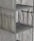 Kick Closet Chaos To The Curb With This Six Tier Hanging Shelf Organizer Packing Deep Pockets For Sweater Storage And Effortless Wardrobe Organization In Durable Soft Gray Fabric showing gray fabric shelves and mesh pockets.
