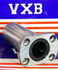 LMH20LUU 20mm Flanged Ball Bushing CNC Linear Motion Bearing 20x32x80mm on a reflective surface.