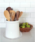 2 Pack 8 Inch Clear Acrylic Turntable Organizer with ceramic utensil holder on kitchen counter