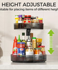 Two Tier Rotating Spice Rack Turntable for Kitchen Cabinet Pantry and Countertop with condiments and sauces displayed.
