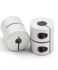 Durable two piece aluminum shaft couplings for 5 to 8 mm shafts, 25 mm long and 20 mm diameter, featuring a screw type clamp.